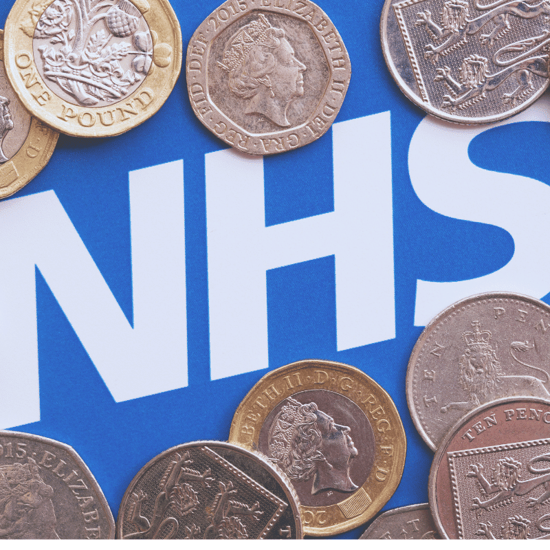 NHS bages with money around the outside to represent cashback that hospitals receive for used cooking oil collections