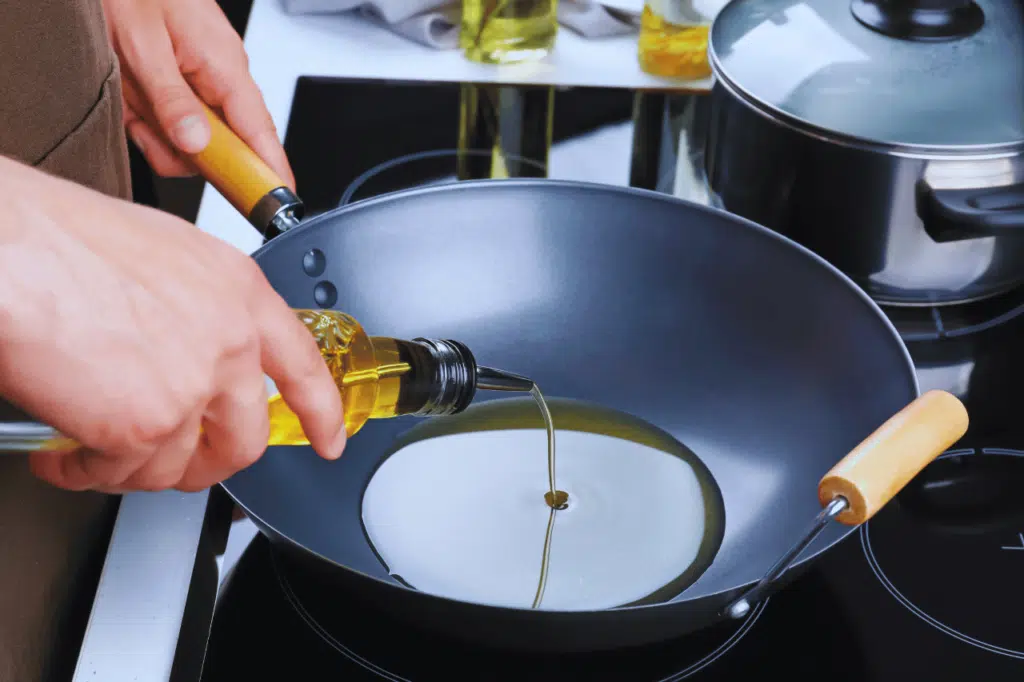 rapeseed oil is good for shallow frying as this chef shows from cooking in a wok